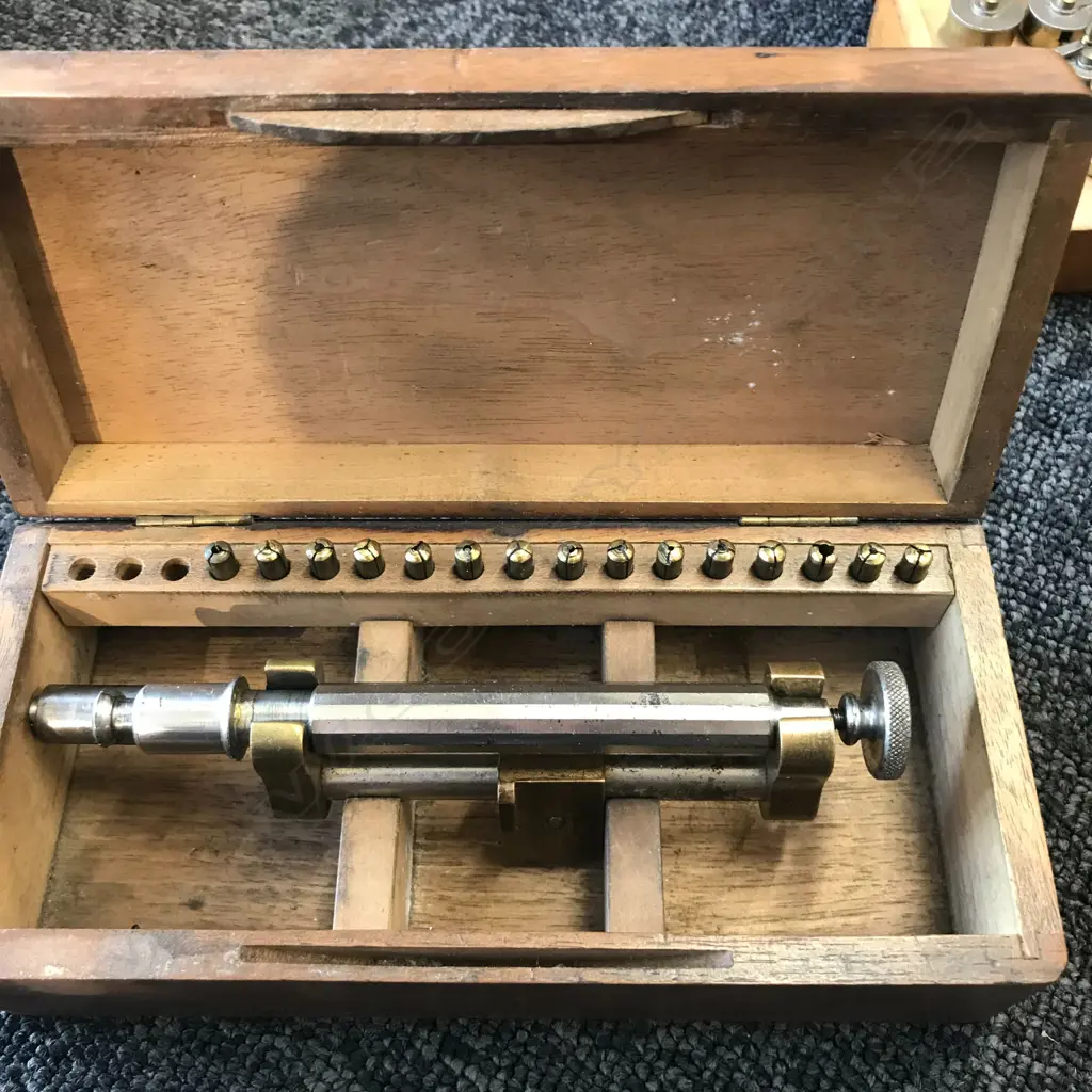 BOXED SCREW HEAD POLISHING TOOLS (2) AND BOXED SWISS 'FAVORITE' MAINSPRING WINDER SET Image 1++